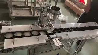 Semi automatic linear bottle cap wadding machine