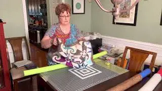 Sandwich a quilt with pool noodles