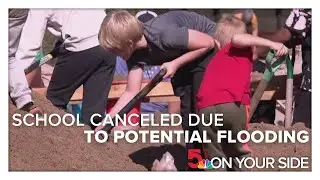 School canceled in Pacific, kids and adults bagging sand instead