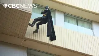 Superheroes swoop in to visit children at Regina General Hospital