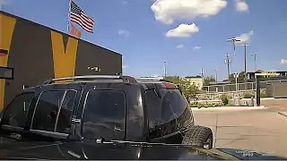 Suspect Rams Police Car Before Fleeing in Stolen SUV