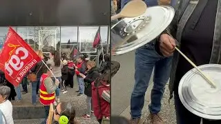 Angry protesters welcome Macron as he visits health centre southwest of Paris | AFP