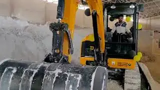 JCB50Z Mini Excavator - Dolomite Unloading from Trailer Truck