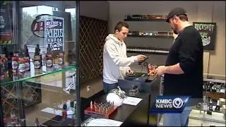 Merchants, users defend e-cigarettes