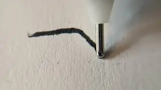 Close-up: Pilot Pen Black Ink Flowing Into Paper