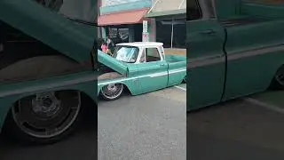 Riding In Style: Vintage Slammed Chevy Pickup Truck At Cruisin' The Coast 2024