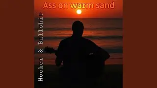 Ass on warm sand