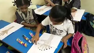 Activity for kids using colours with paw print 