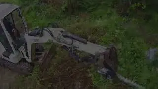 Running a finger bar hedge cutter on my excavator