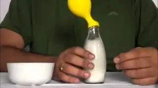 blow balloon with baking soda and lemon