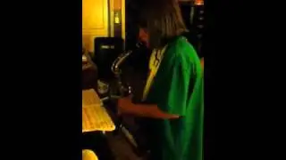 My little cousin playing the saxophone