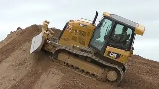 Caterpillar D5K2 Bulldozer Working on Steep Hill
