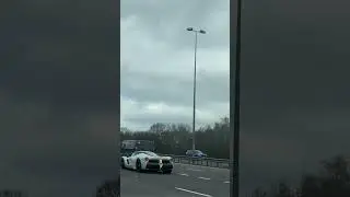 Behold, a rare and stunning white Ferrari LaFerrari Aperta gliding through motorway