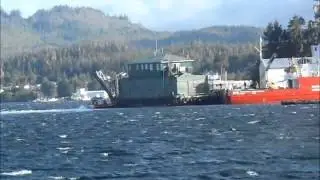 CCGS Gordon Reid rescues a barge that has broken its mooring.