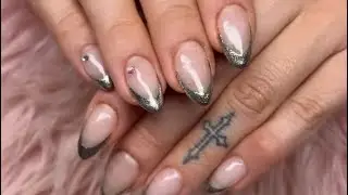 Clear nails with silver chrome frenchies