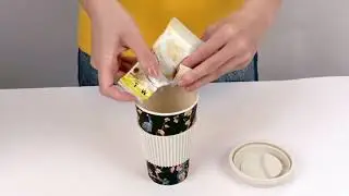 Bamboo fiber coffee mug to go with silicone lid and grip