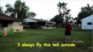 Tail_Boom_Terry flying his V911 Helicopter outside