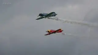 Bon formation 2x Yakovlev Yak-52 Smoke On low Pass Multicam Teuge Airport 14 Aug 2021