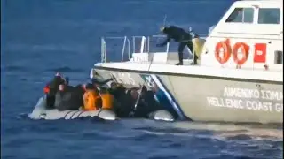 Greek coast guard 'fires shots' at refugee boat in video released by Turkish government