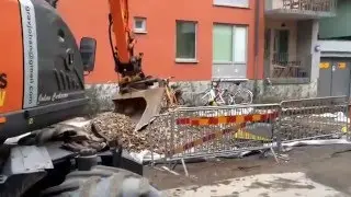 Hitachi ZX140W on a street renovation