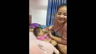 BREASTFEEDING BABY BY BEAUTIFUL MOTHER.