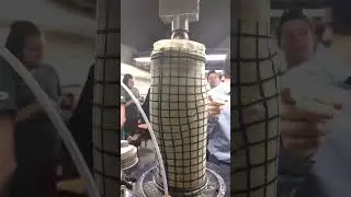 This is What Happens when You Compress Sand: Triaxial Compression of Dense Sand