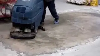 Epoxy removal mock up: Auto scrubbing (cleaning) progress in Cedar Rapids, Iowa