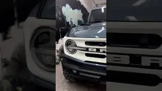 Wrapping grill & accent stripes with Avery Dennison Gloss White. Really makes this Bronco stand out!