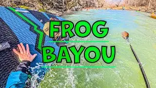 Paddle boarding the Frog Bayou with a bunch of kayakers| Hala Atcha 86