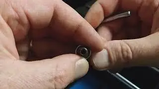 Cleaning the nozzle on a FlashForge Guider II MK10.