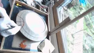 Kintsugi, step 10,  applying real gold to plate