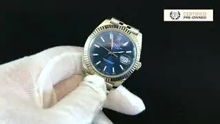 Pre-owned Rolex DateJust 41mm S/Steel with White Gold Fluted Bezel and Blue Dial on timetofind.com