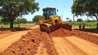 Komatsu Bulldozer in Full Action, Red Dirt Master at Work, Heavy Equipment Making Roads Look Easy
