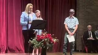 Jess receives the Tim Gibson Memorial Scholarship at the senior awards at Loveland High School, CO