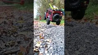 Traxxas land rover defender jumps over a mound of gravel #traxxas #landrover #defender #crawler #rc