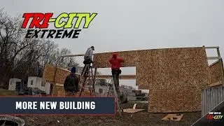 Putting up more new buildings on the field at Capital Combat Zone!