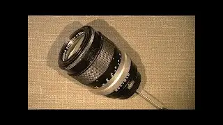 Oil on the aperture blades in Non-Ai Nikkor-Q Auto 1:2.8 f=135mm