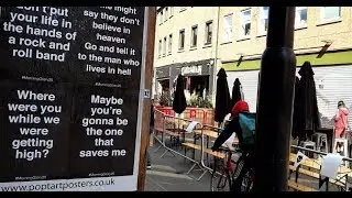 Posters of Oasis lyrics have appeared across the city centre  - News Today