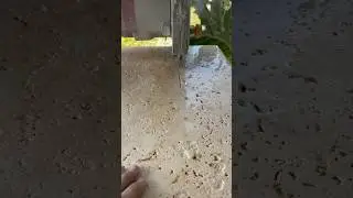 Wetsaw cutting through tumbled travertine #video #satisfying #asmr #asmrvideo #shorts #shortvideo