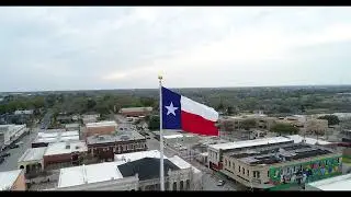 Texas Flag flying over the Washington county courthouse for Texas Independence Day.