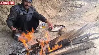 Traditional fishing skills of nomad men in the river on a rainy day | Baking local bread