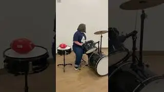 Katie playing the drums 🥁