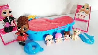 #LOL surprise pool party #SLIME SURPRISE | Lil sisters play in slime
