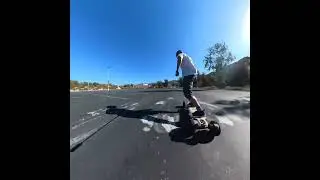 Miles Rampage Electric Skateboard - riding in a parking lot