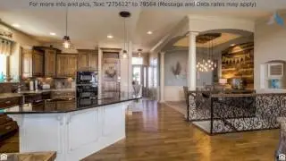 Priced at $345,000 - 1217 Kettering Lane, Raymore, MO 64083