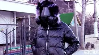 GLOSSY BLACK OVERSIZE JACKET WITH BIG HOOD AND FAUX FUR + BLACK PANORAMIC GAS MASK WITH TWO FILTERS.