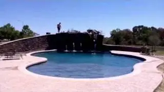 Crazy man jumps off cliff