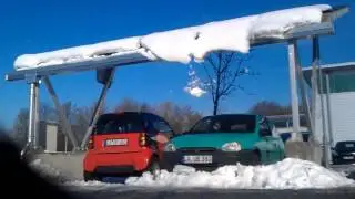 Huge roof avalanche destroys german car