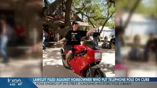 Lawsuit: neighbor negligently left pole near street before crash