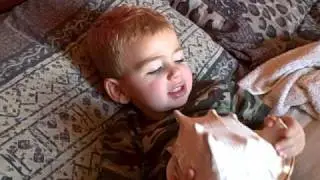 Everett Plays a Conch Shell